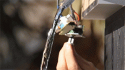 What happens when a stream of water is exposed to an audio speaker producing a loud 24hz sine wave.﻿