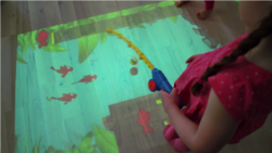 Lumo projects an interactive, motion-sensitive game experience onto walls and floors