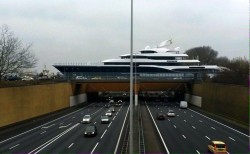 Just another day in Holland, luxury yacht crossing a highway
