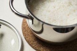 Scientists have discovered a simple way to cook rice that dramatically cuts the calories – ...