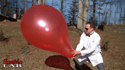 Giant balloon pop in slow motion.