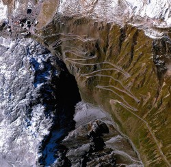 This is the Stelvio Pass in northern Italy; the snaking mountain pass is the highest paved roadw ...