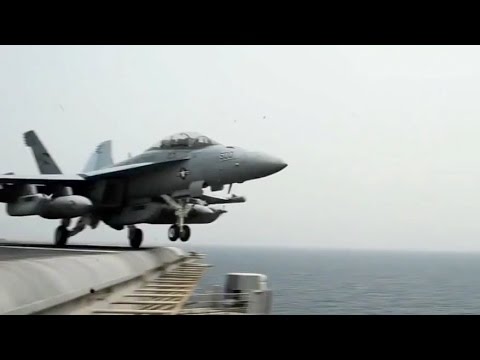 Watch a US Navy aircraft carrier launch all its F-18 fighter jets – YouTube