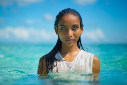 A girl from the Maldives with aqua blue eyes