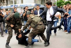 Erdogan aide who battered a mourning miner after the mine disaster has court block negative soci ...