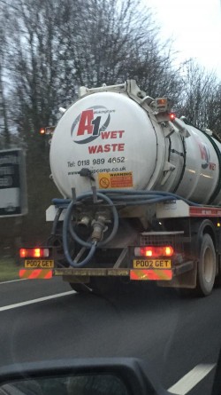 This trucks number plate describes its job