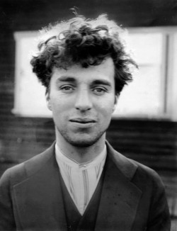Charlie Chaplin minus his famous ‘tache & hat: 1916