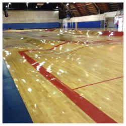 Water pipes burst underneath a basketball court