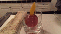 Cocktail inside an ice ball
