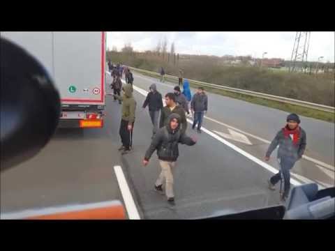 Angry Truck Driver vs Migrants at Calais (Eng subtitles) – YouTube