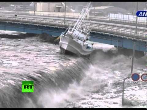 Sea walls fail: The waves easily pour over sea walls, taking boats and debris with them.