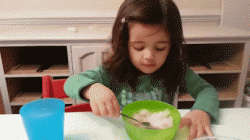 Little girl + ice cream and first time brain freeze﻿