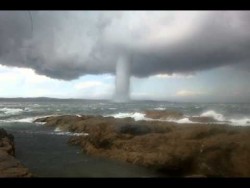 A waterspout is an intense columnar vortex that occurs over a body of water. They most commonly  ...