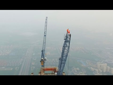Couple Climbs The HIGHEST CONSTRUCTION SITE IN THE WORLD 640M – YouTube