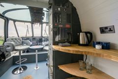Take a look at the old Royal Navy Sea King helicopter which has been transformed into a glamping ...
