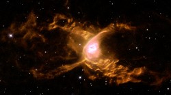 The Red Spider Nebula is home to one of the hottest stars known and its powerful stellar winds g ...