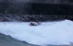 Video of yacht capsized by breaking wave