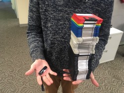 128gb flash drive in his right hand and 132mb worth of floppy disks in his left.