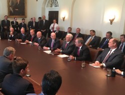 Room full of male lawmakers, discussing taking away maternity coverage