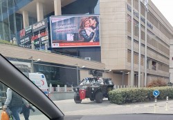 Turkish hospitality at a shopping mall, a police tank with remote controlled machine draped in a ...