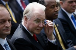 Reporter arrested for asking Tom Price if domestic violence is a pre-existing condition under…