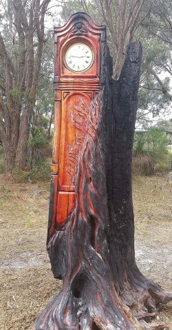 “Finding Time” Chainsaw art