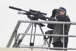 Snipers spotted on Manchester rooftops ahead of huge protest against Conservative Party Conferen ...