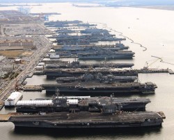That’s a lot of aircraft carriers! I’ve been on CVN-77 in the foreground, amazing ships.