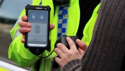 UK police are now using fingerprint scanners on the streets to identify people in less than a mi ...