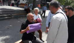 Turkish police intervene against protester with blank sign | Ahval