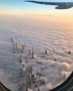 Dubai’s towers through the fog