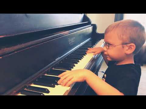 6 year old blind boy plays/sings Bohemian Rhapsody