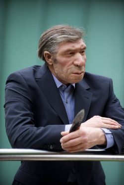Lifelike reconstruction of Neanderthal man in a modern setting – Neanderthal Museum , Germany