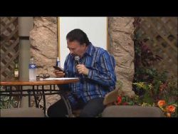 Preacher stops to check his phone while “speaking in tongues”