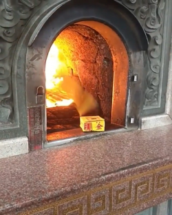Notepages being sucked into a fire