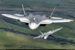 Two Sukhoi T-50s gliding over Russia.