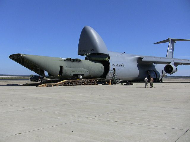 A C-5 Galaxy devouring a C-130 Hercules