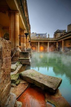 Roman Baths are well-preserved thermae in city of Bath, Somerset, England. A temple constructed  ...