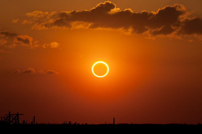 Solar Eclipse during a sunset
