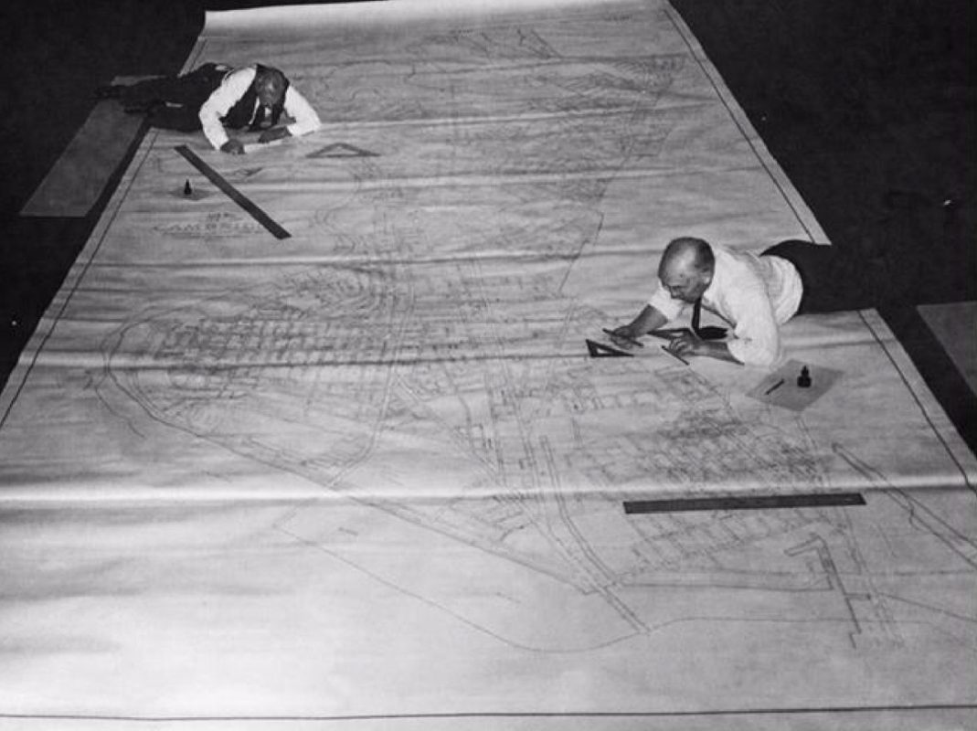 Before computers, we relied on t-squares, rulers & ink. Workers map Cambridge electrical sys ...