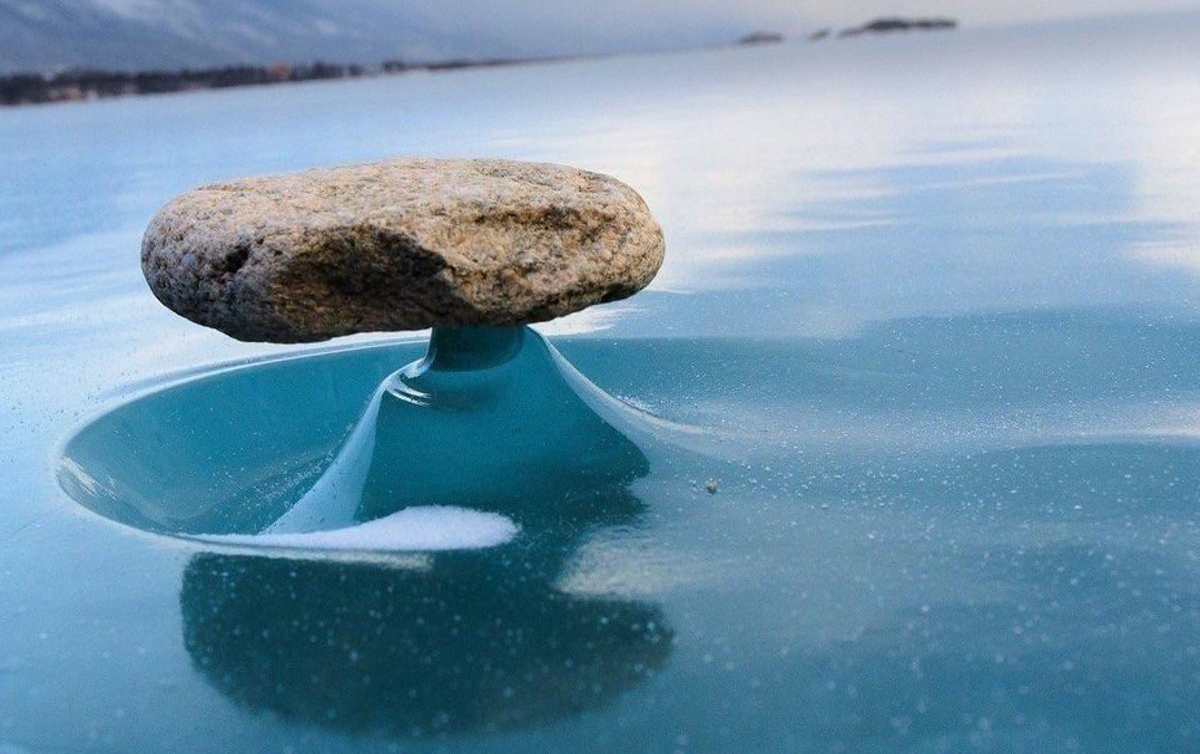 Rock on the frozen lake Baikal