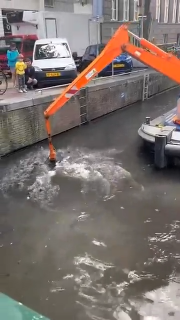 Cleaning Canals in Amsterdam