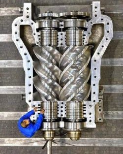 Twin scroll supercharger for a marine engine
