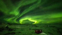 An aurora lighting up the night sky over Zhongshan Station in Antarctica captured with a spectac ...