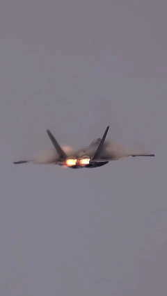 The majestic vapour cone forming around an F-22 Raptor