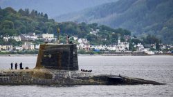 This submarine is docking after spending 6 months underwater on a tour of duty